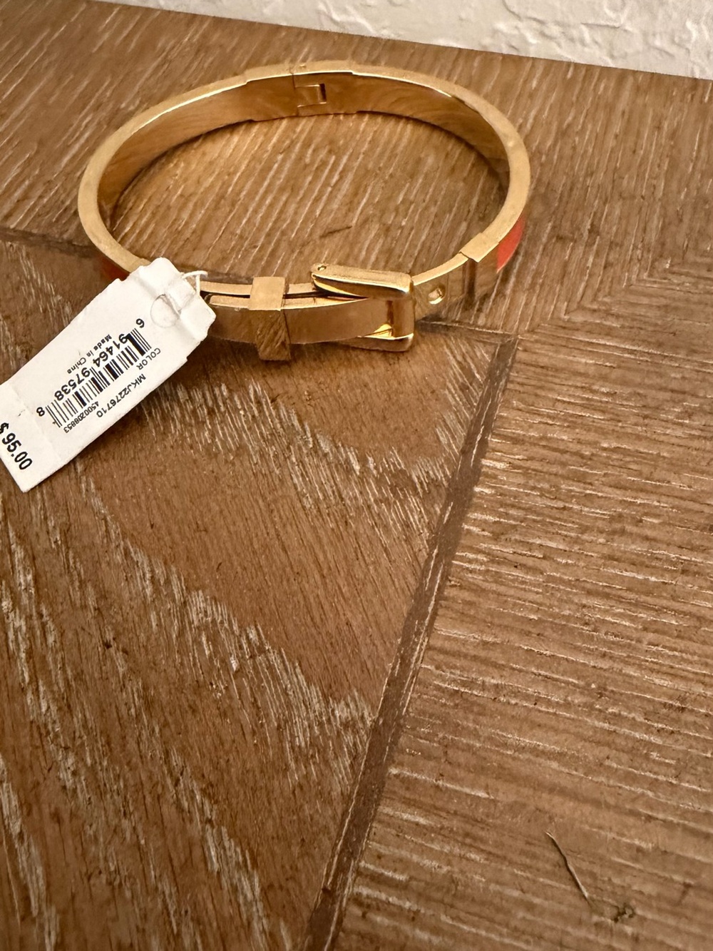 Michael Kors Gold Bracelet with Buckle Accent and Coral Detail